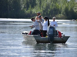 Boating on the river near the cabin.